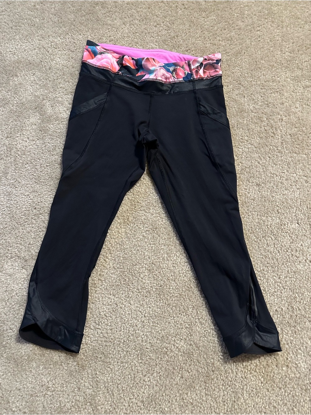 Women’s Lululemon capri leggings, size 6, black with floral waist